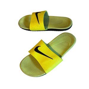 Nike slides neon yellow and black in color size 7 Y